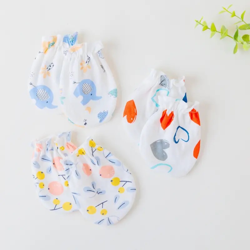 Lot 2 moufle bébé en coton décorer